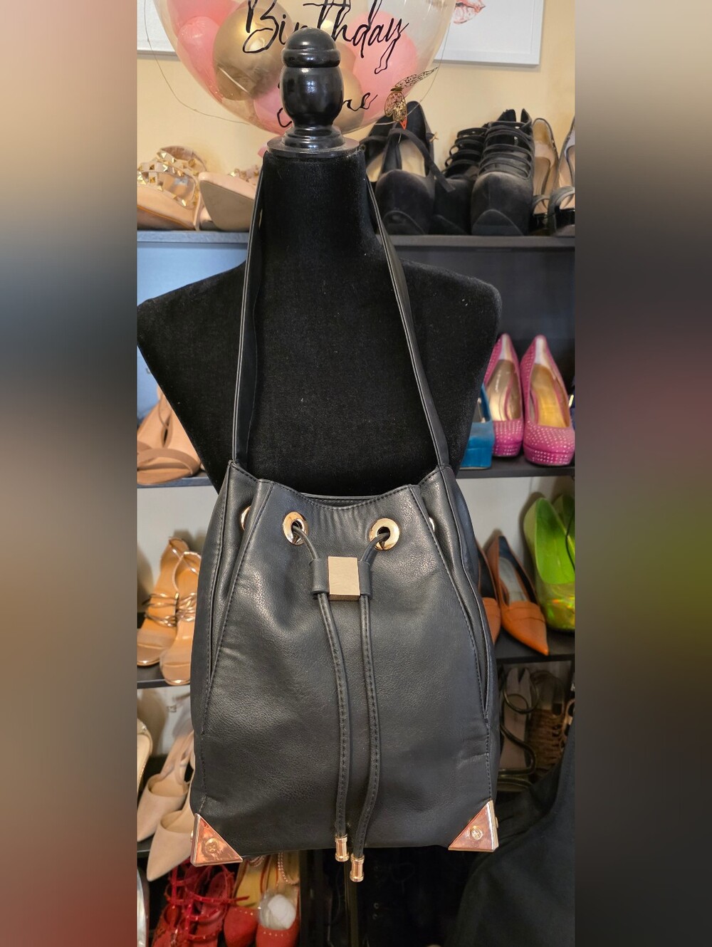Black Drawstring Shoulder Bag with Gold Accents. Was used couple Of Times.